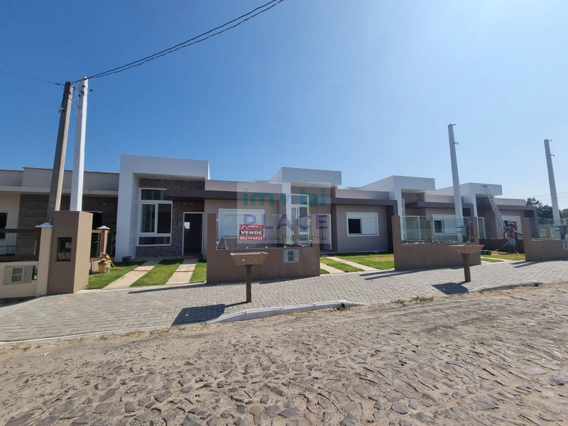 Anúncio de Venda - Casas Geminadas com 02 Dormitórios (1 Suíte): 1ª foto da galeria de imagens do imóvel