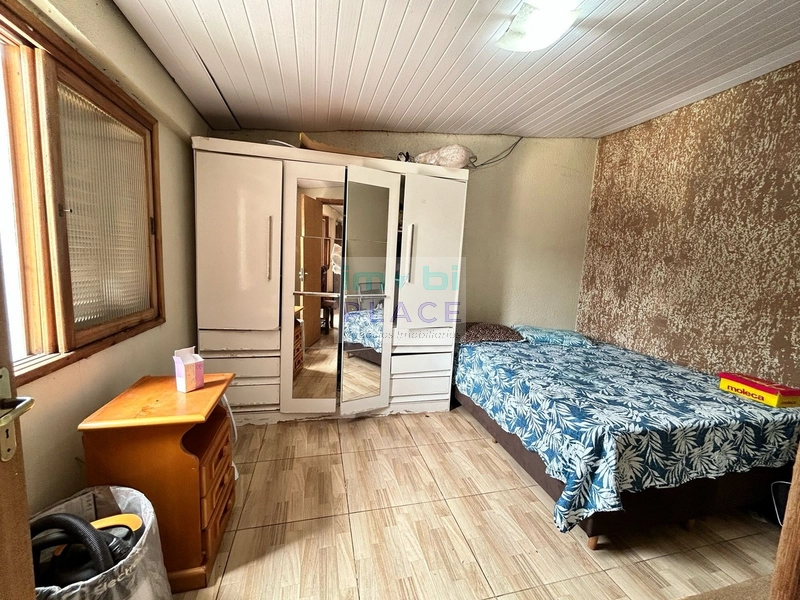Pátio Amplo com Duas Casas – Conforto e Praticidade Perto de Tudo: 39ª foto da galeria de imagens do imóvel