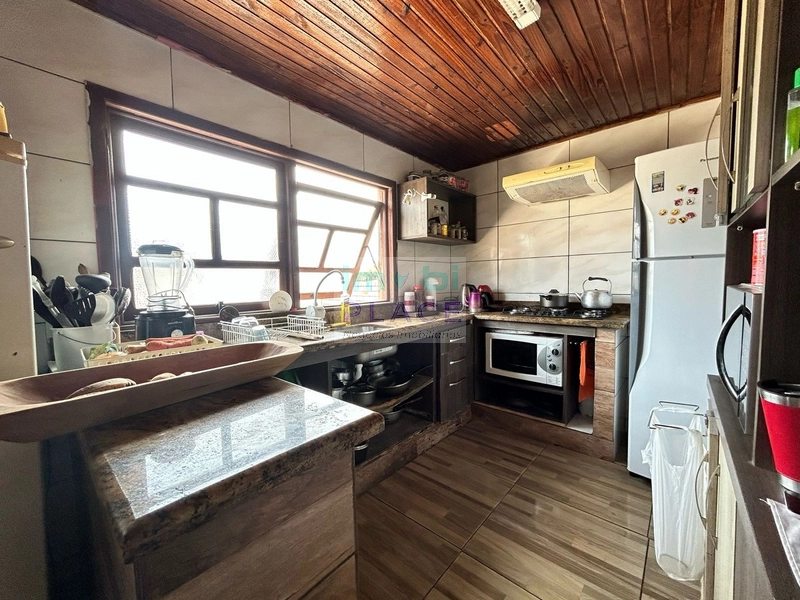 Pátio Amplo com Duas Casas – Conforto e Praticidade Perto de Tudo: 12ª foto da galeria de imagens do imóvel