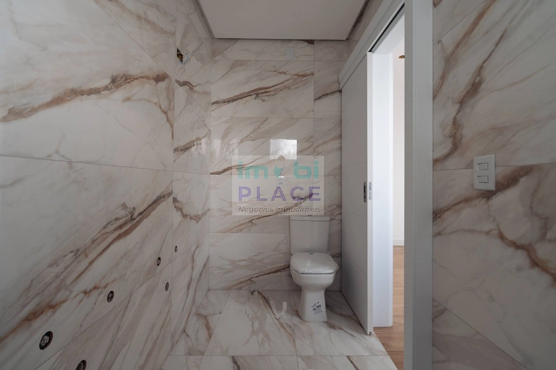 Casa de Alto Padrão no Centro de Imbé – Design Moderno e Acabamentos I: 30ª foto da galeria de imagens do imóvel