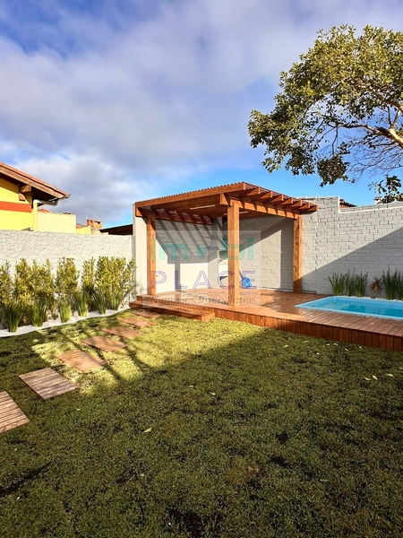 Casa ampla no Centro de Imbé – 4 dormitórios, piscina e espaço gourmet: 4ª foto da galeria de imagens do imóvel