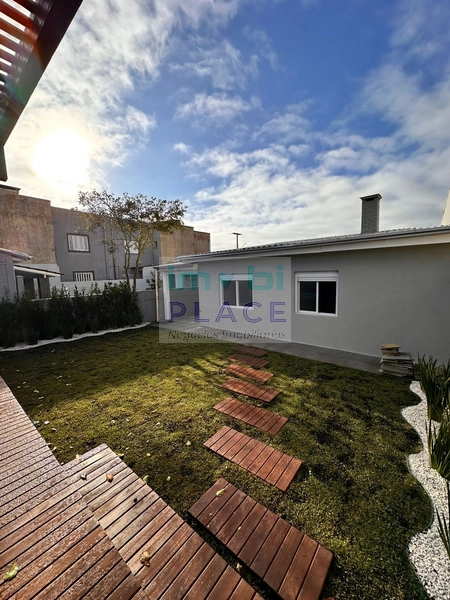 Casa ampla no Centro de Imbé – 4 dormitórios, piscina e espaço gourmet: 2ª foto da galeria de imagens do imóvel