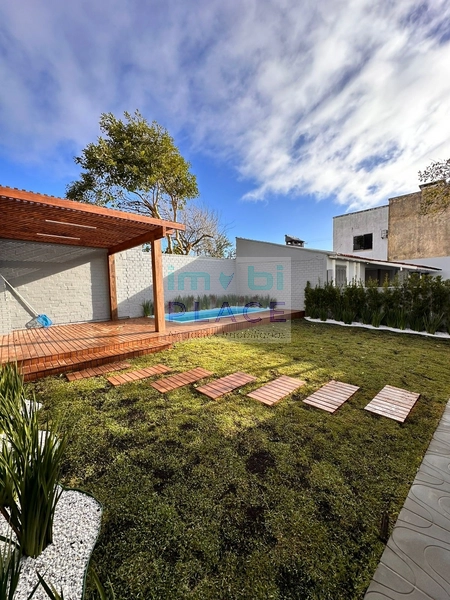 Casa ampla no Centro de Imbé – 4 dormitórios, piscina e espaço gourmet: 10ª foto da galeria de imagens do imóvel