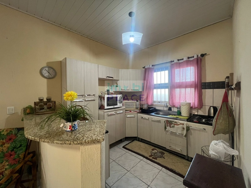 Casa Ampla com 3 Dormitórios e Terreno Espaçoso – Próxima ao Mar!: 8ª foto da galeria de imagens do imóvel