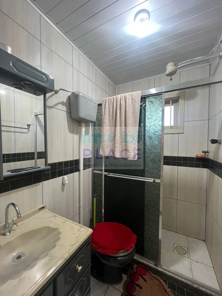 Casa Ampla com 3 Dormitórios e Terreno Espaçoso – Próxima ao Mar!: 12ª foto da galeria de imagens do imóvel
