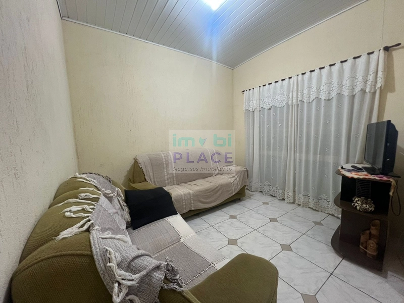 Casa Ampla com 3 Dormitórios e Terreno Espaçoso – Próxima ao Mar!: 2ª foto da galeria de imagens do imóvel