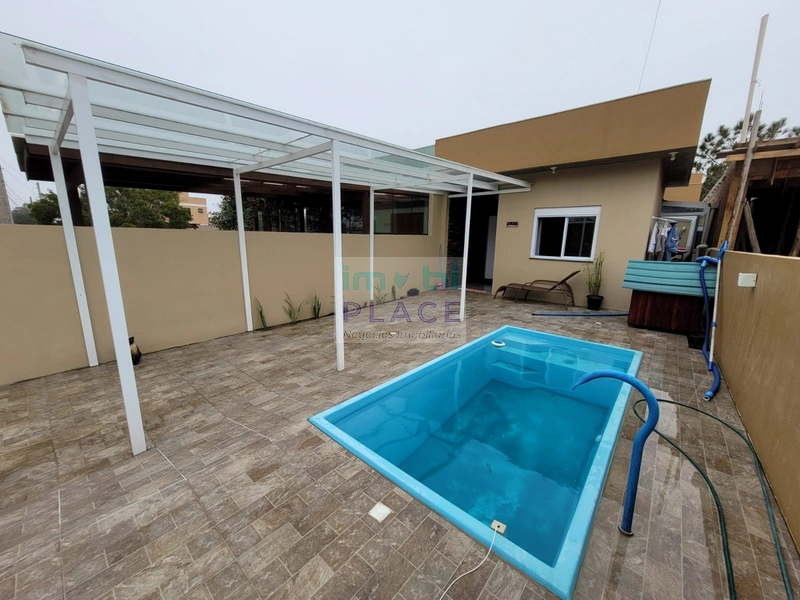 CASA COM PISCINA 2 DORMITÓRIOS EM NOVA TRAMANDAÍ: 3ª foto da galeria de imagens do imóvel