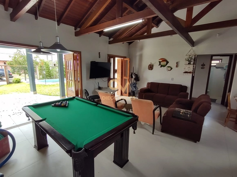 Belíssima casa com piscina próxima ao mar Atlântida Sul: 9ª foto da galeria de imagens do imóvel