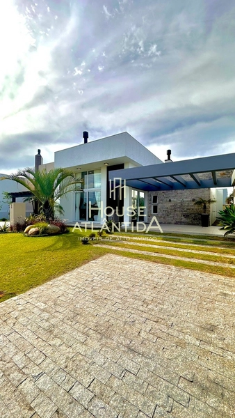 Residência térrea estilo contemporâneo no condomínio Riviera Xangri la: 2ª foto da galeria de imagens do imóvel