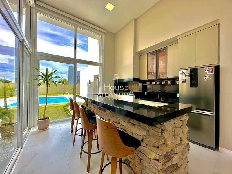 Residência térrea estilo contemporâneo no condomínio Riviera Xangri la: 12ª foto da galeria de imagens do imóvel