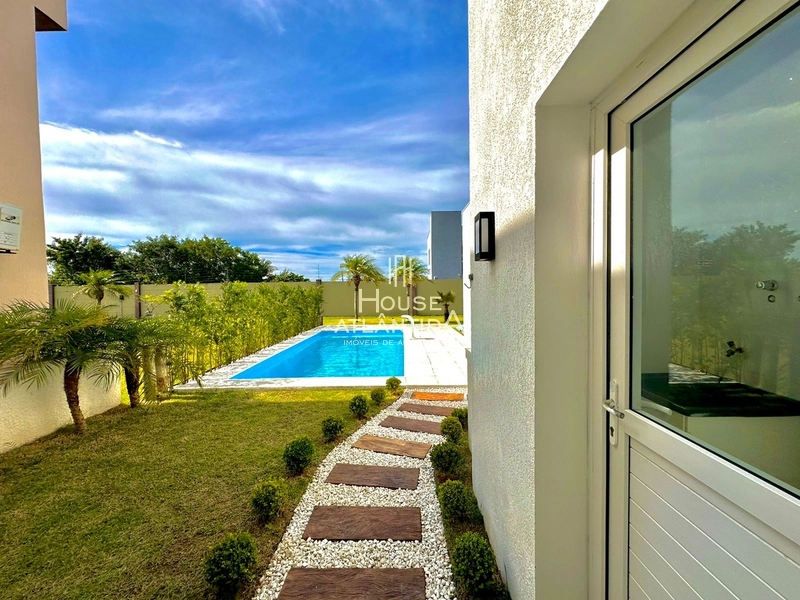 Residência térrea estilo contemporâneo no condomínio Riviera Xangri la: 31ª foto da galeria de imagens do imóvel