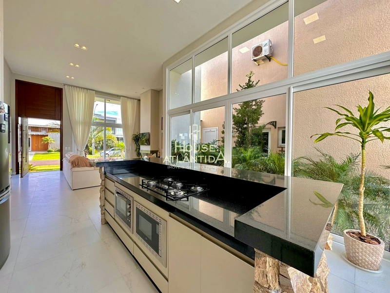 Residência térrea estilo contemporâneo no condomínio Riviera Xangri la: 16ª foto da galeria de imagens do imóvel