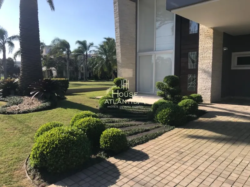 Sobrado em Atlântida condomínio fechado finamente decorada e mobiliada: 3ª foto da galeria de imagens do imóvel