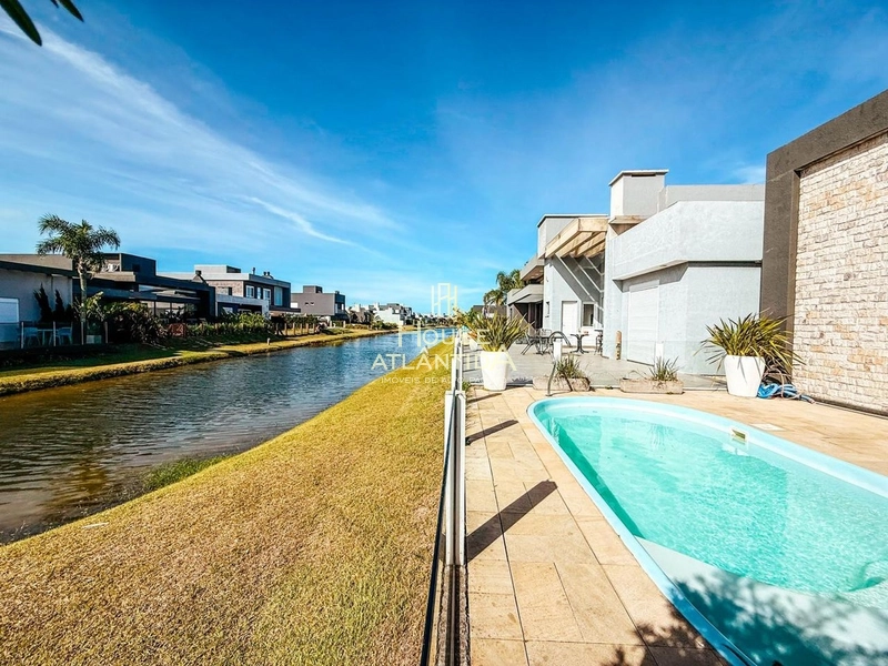 Casa térrea de esquina a venda no Condomínio Riviera, na beira de lago: 15ª foto da galeria de imagens do imóvel