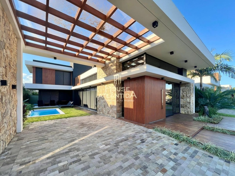 Linda casa, no condomínio Villagio de Atlântida.: 4ª foto da galeria de imagens do imóvel