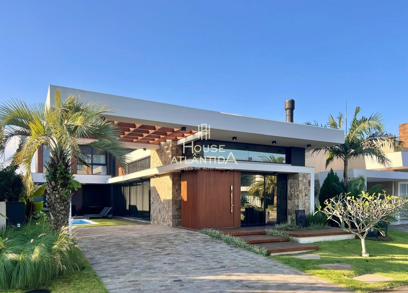 Linda casa, no condomínio Villagio de Atlântida.: 1ª foto da galeria de imagens do imóvel
