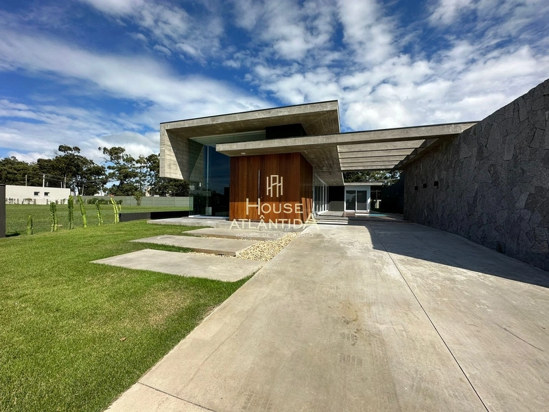 Casa térrea a venda no Condomínio Villaggio Atlântida, 05 suites: 3ª foto da galeria de imagens do imóvel