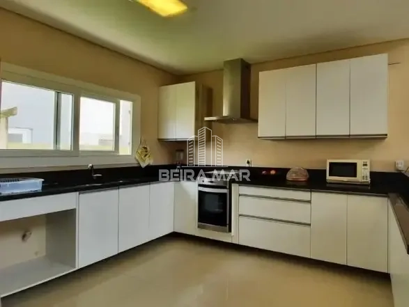 Sobrado composto por 4 suítes em Atlântida: 5ª foto da galeria de imagens do imóvel