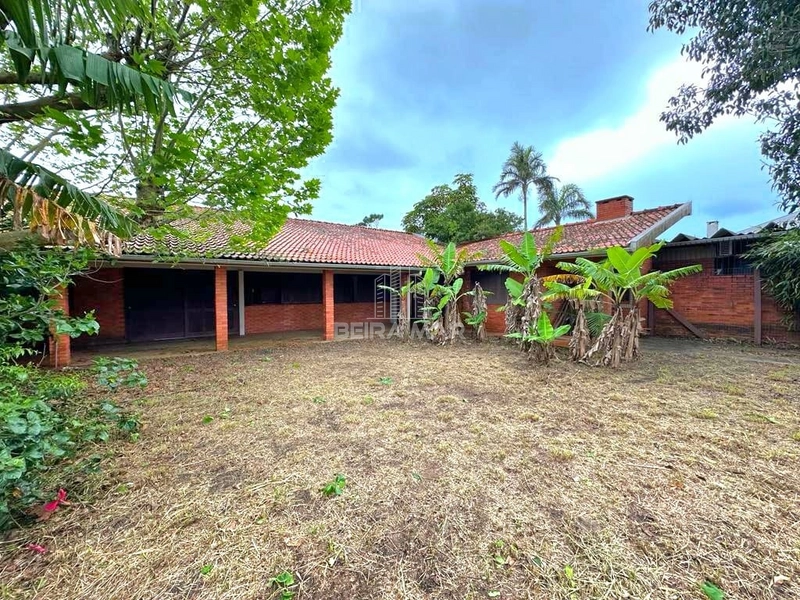 Casa térrea na área central de Atlântida: 1ª foto da galeria de imagens do imóvel
