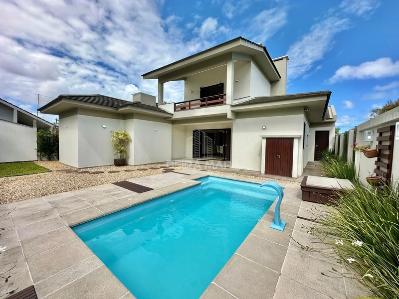 CASA DE ALTO PADRÃO À VENDA EM ATLÂNTIDA: 3ª foto da galeria de imagens do imóvel