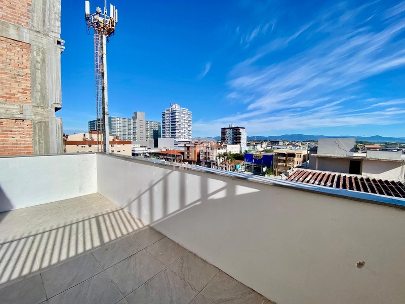 APARTAMENTO AO LADO DA PRAÇA FLAVIO EM CAPÃO DA CANOA: 3ª foto da galeria de imagens do imóvel