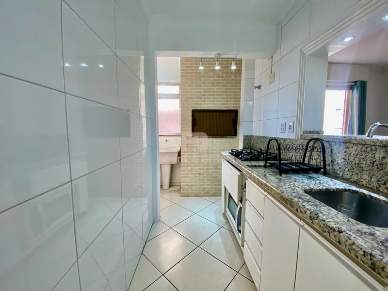 APARTAMENTO AO LADO DA PRAÇA FLAVIO EM CAPÃO DA CANOA: 18ª foto da galeria de imagens do imóvel
