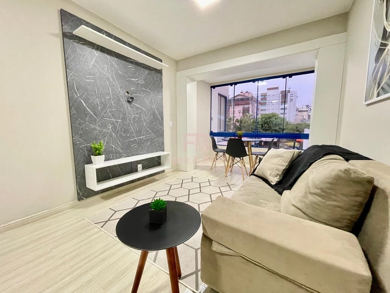 APARTAMENTO A VENDA DE FRENTE PARA PRAÇA EM CAPÃO DA CANOA: 3ª foto da galeria de imagens do imóvel
