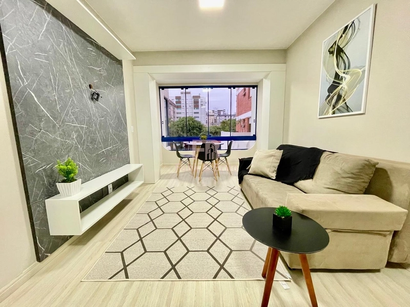 APARTAMENTO A VENDA DE FRENTE PARA PRAÇA EM CAPÃO DA CANOA: 1ª foto da galeria de imagens do imóvel