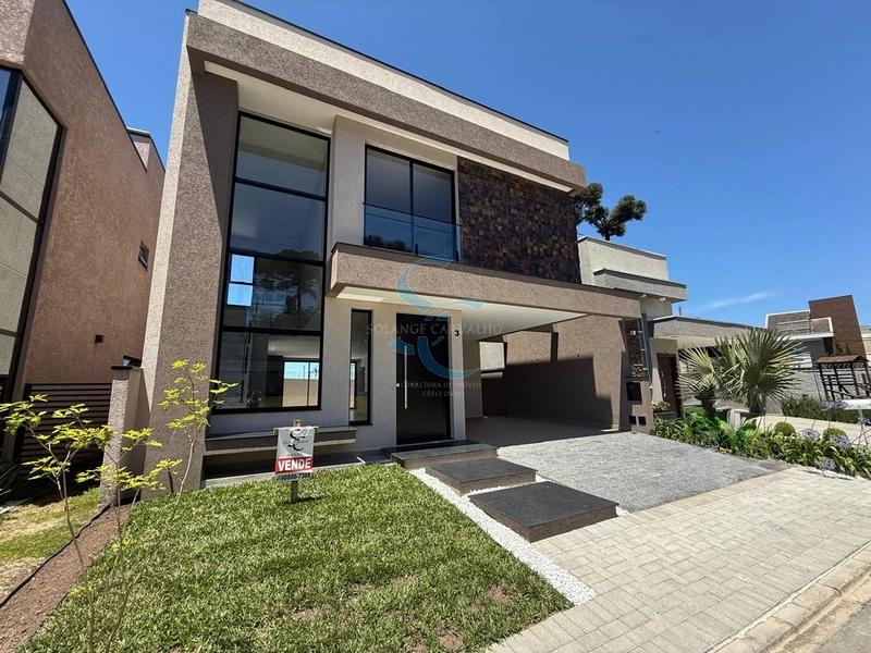 CASA COM 4 QUARTOS SENDO UMA SUÍTE EM CONDOMÍNIO FECHADO