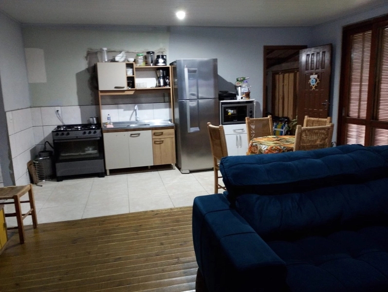 Casa Aconchegante com 2 Dormitórios, Garagem Fechada e Pátio Amplo: 17ª foto da galeria de imagens do imóvel