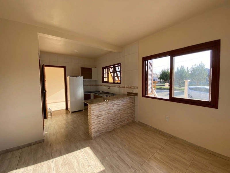 Casa com Suíte, Varanda com Churrasqueira e 98m² de Construção: 6ª foto da galeria de imagens do imóvel