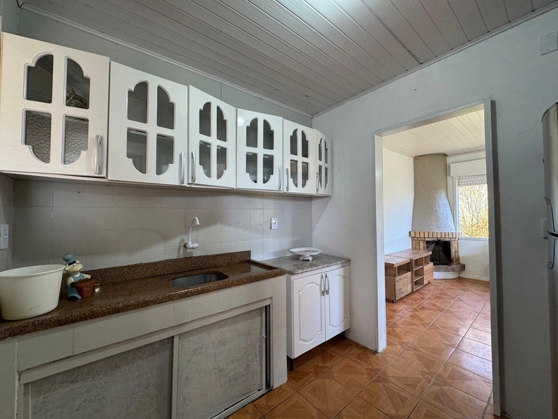 Casa com Suíte, Lareira e Amplo Espaço Verde para Lazer e Conforto!: 10ª foto da galeria de imagens do imóvel