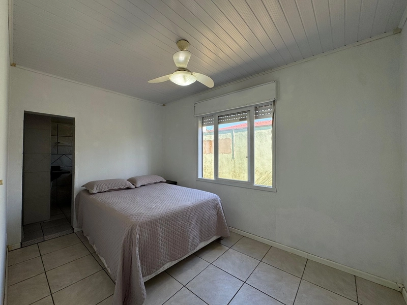 Casa com Suíte, Lareira e Amplo Espaço Verde para Lazer e Conforto!: 13ª foto da galeria de imagens do imóvel