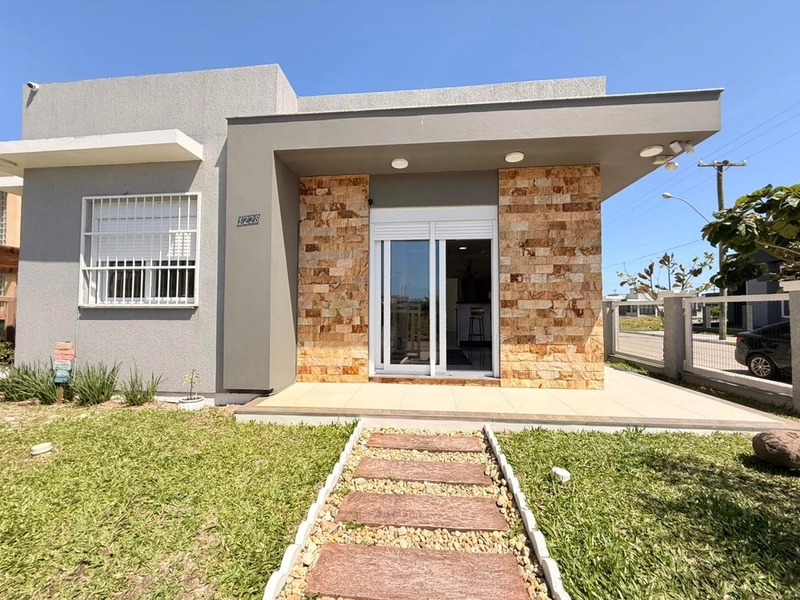 Casa Geminada com Suíte, Churrasqueira e Garagem Fechada!: 2ª foto da galeria de imagens do imóvel