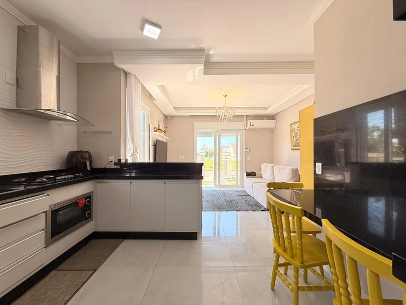 Casa Geminada com Suíte, Churrasqueira e Garagem Fechada!: 5ª foto da galeria de imagens do imóvel