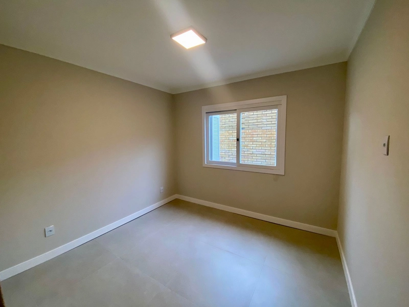 Residência Moderna no Centro – 3 Dormitórios, 2 Suítes e Amplo Pátio!: 13ª foto da galeria de imagens do imóvel