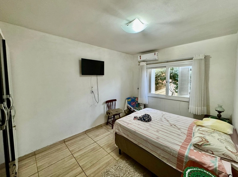 Linda Casa com 2 Dormitórios, Pátio Amplo e Ótima Localização!: 14ª foto da galeria de imagens do imóvel