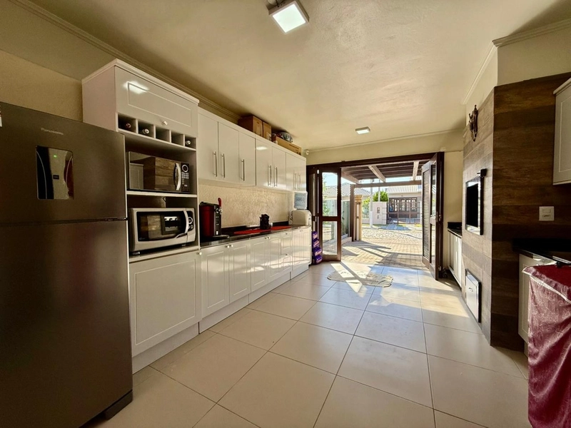 Casa com Piscina, Salão de Festas, Lareira e Acabamentos em Itaúba: 11ª foto da galeria de imagens do imóvel