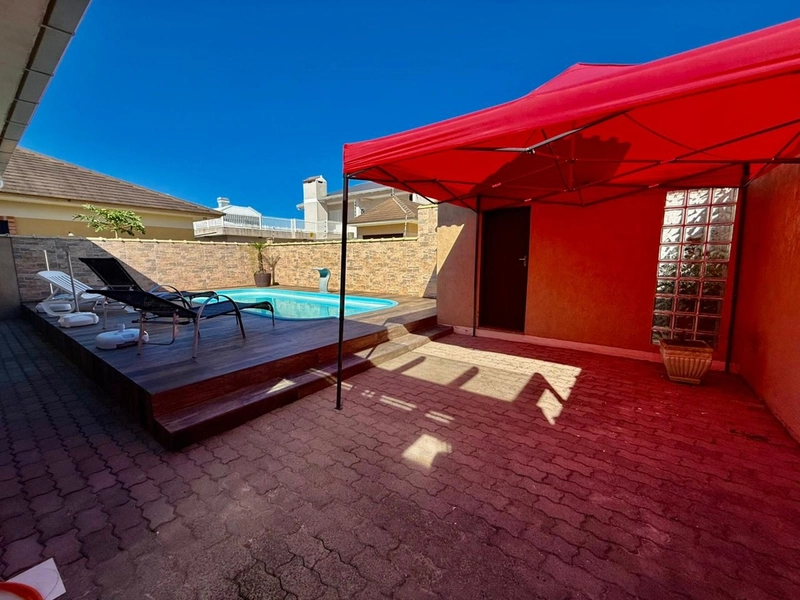 Casa com Piscina, Salão de Festas, Lareira e Acabamentos em Itaúba: 28ª foto da galeria de imagens do imóvel