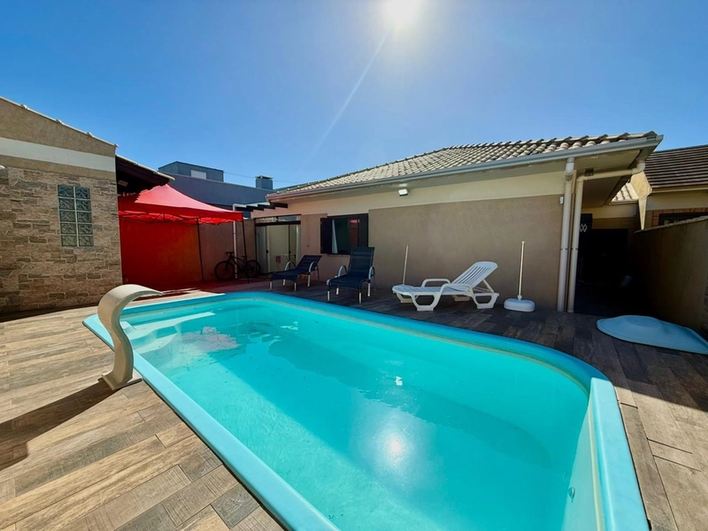 Casa com Piscina, Salão de Festas, Lareira e Acabamentos em Itaúba: 8ª foto da galeria de imagens do imóvel