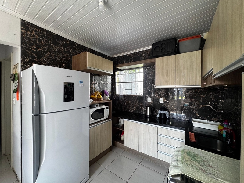 Casa com 3 Dormitórios, Suíte e Área Gourmet!: 6ª foto da galeria de imagens do imóvel