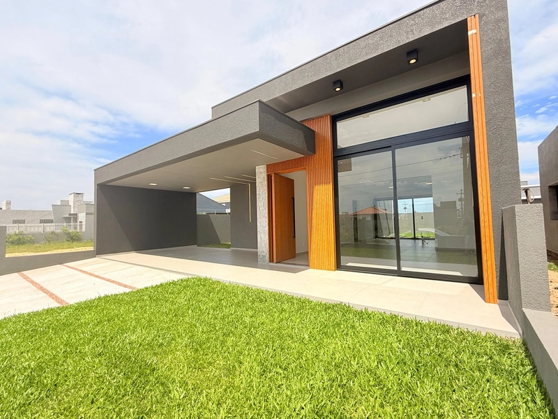 Casa de 140m² com Suíte e Lareira em Atlântida Sul: 1ª foto da galeria de imagens do imóvel