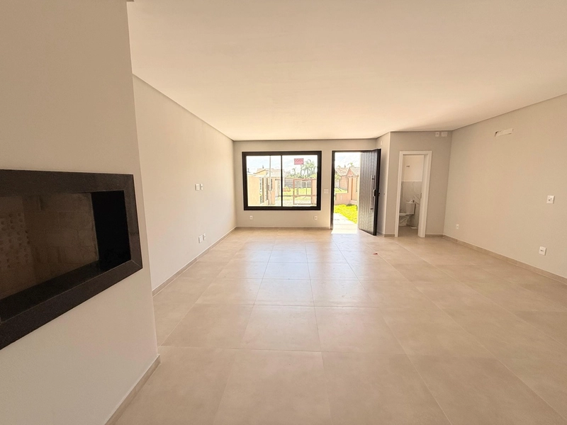 Casa em Ótima Localização, 2 Dormitórios e Living Integrado!: 3ª foto da galeria de imagens do imóvel