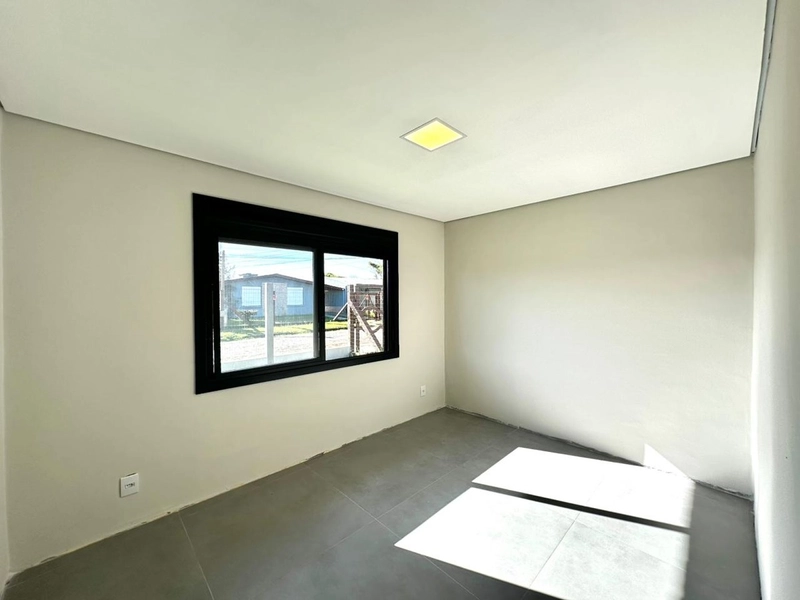 Linda Casa a 300m do Mar em Atlântida Sul – Pronta para Morar!: 10ª foto da galeria de imagens do imóvel