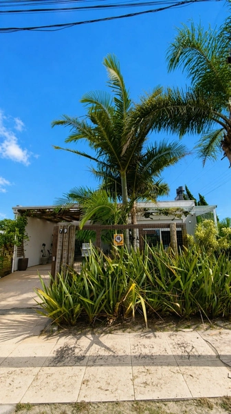 Casa Completa e Charmosa em Xangri-Lá com Piscina e Espaço Gourmet!: 1ª foto da galeria de imagens do imóvel