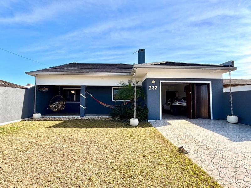 Casa com 3 Dormitórios, Living integrado e Garagem com Churrasqueira!: 1ª foto da galeria de imagens do imóvel