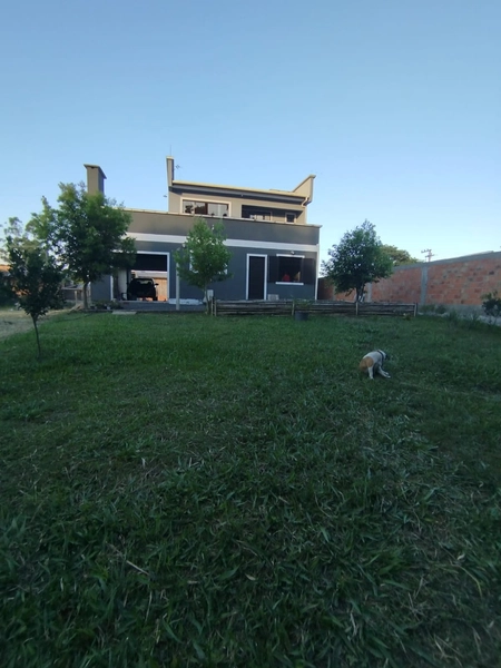 Excelente residência na Costa do Mampituba: 3ª foto da galeria de imagens do imóvel