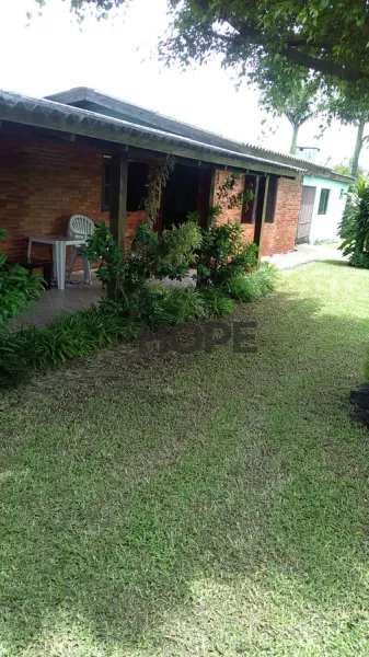 CASA COMPOSTA POR 3 DORMITÓRIOS EM CAPÃO DA CANOA!: 1ª foto da galeria de imagens do imóvel