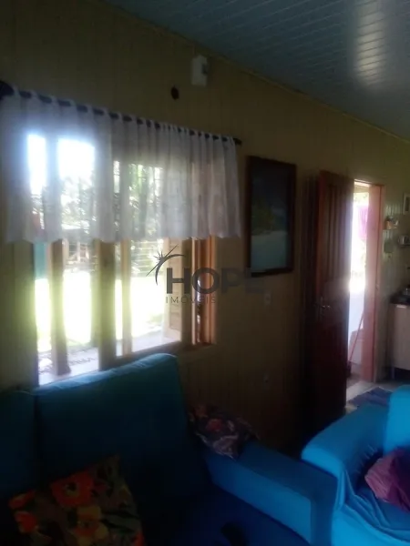CASA DE MADEIRA COMPOSTA POR 2 DORMITÓRIOS EM XANGRI-LÁ!: 8ª foto da galeria de imagens do imóvel