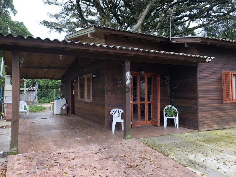 CASA DE MADEIRA COMPOSTA POR 2 DORMITÓRIOS EM XANGRI-LÁ!: 2ª foto da galeria de imagens do imóvel